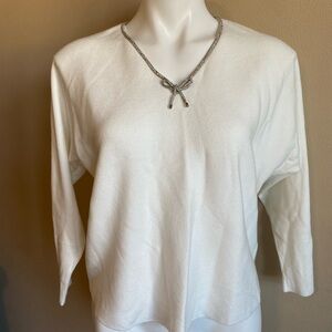 Elegant White Blouse with Necklace Detail